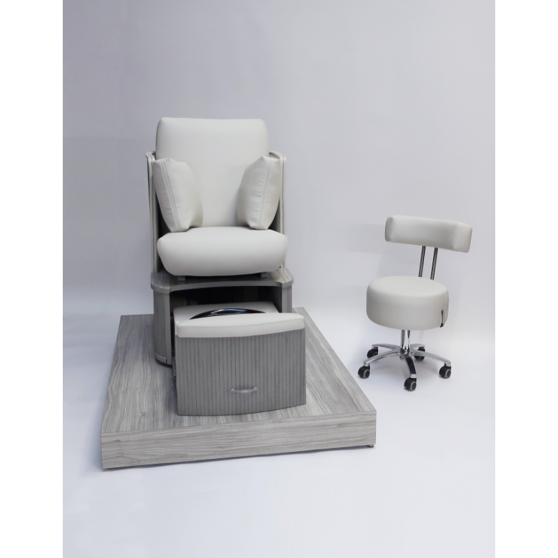 Belava Dorset Lounge Style Pedicure Chair With/Without Plumbing White and Light Gray Wood Finish Raised Platform Front View With Technician Stool and Pillows