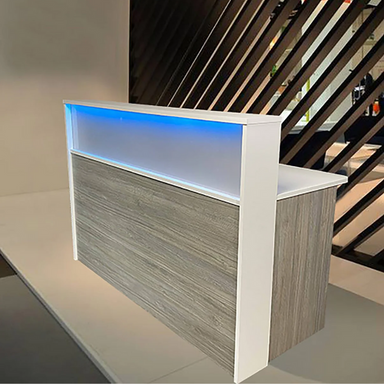 Reception Counter Solutions Frosted Malibu Reception Desk With Led Lights Front View Display in Sand Wash Light Rustic Wood Color 5 Feet Wide